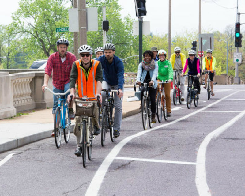 Riding single file within designated lanes helps keep bicyclists safe.